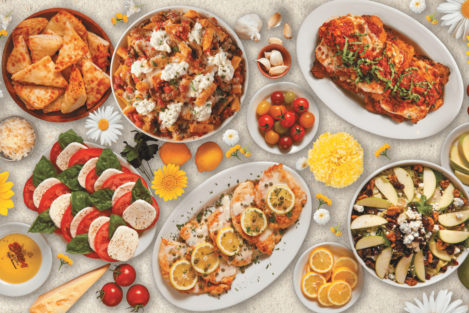 A spread of entrees and side dishes with Spring decor from Buca di Beppo