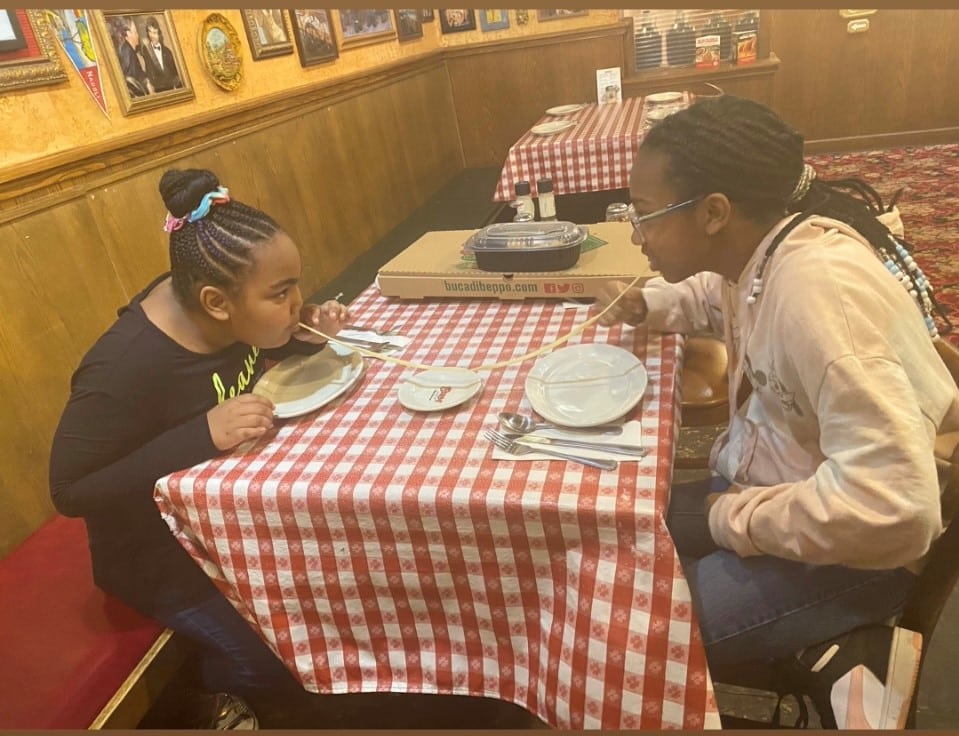 A girl and mother trying the for the love of pasta challenge