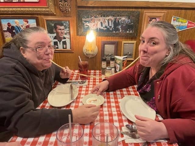 Two ladies trying the pasta challenge