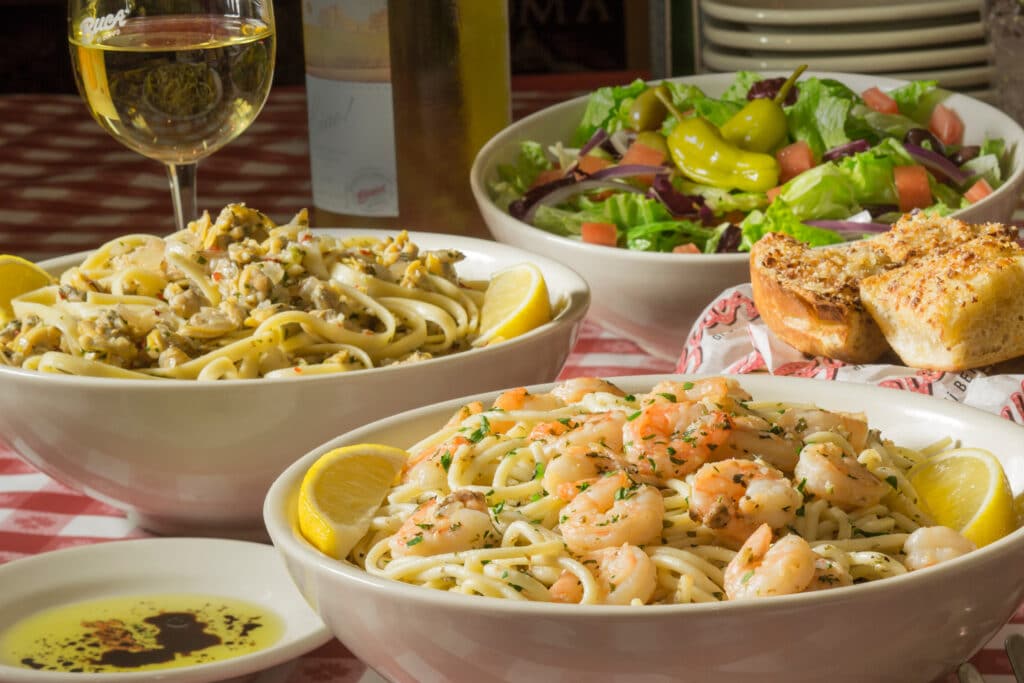 Linguine & Clams and Shrimp Scampi served with a salad and garlic bread